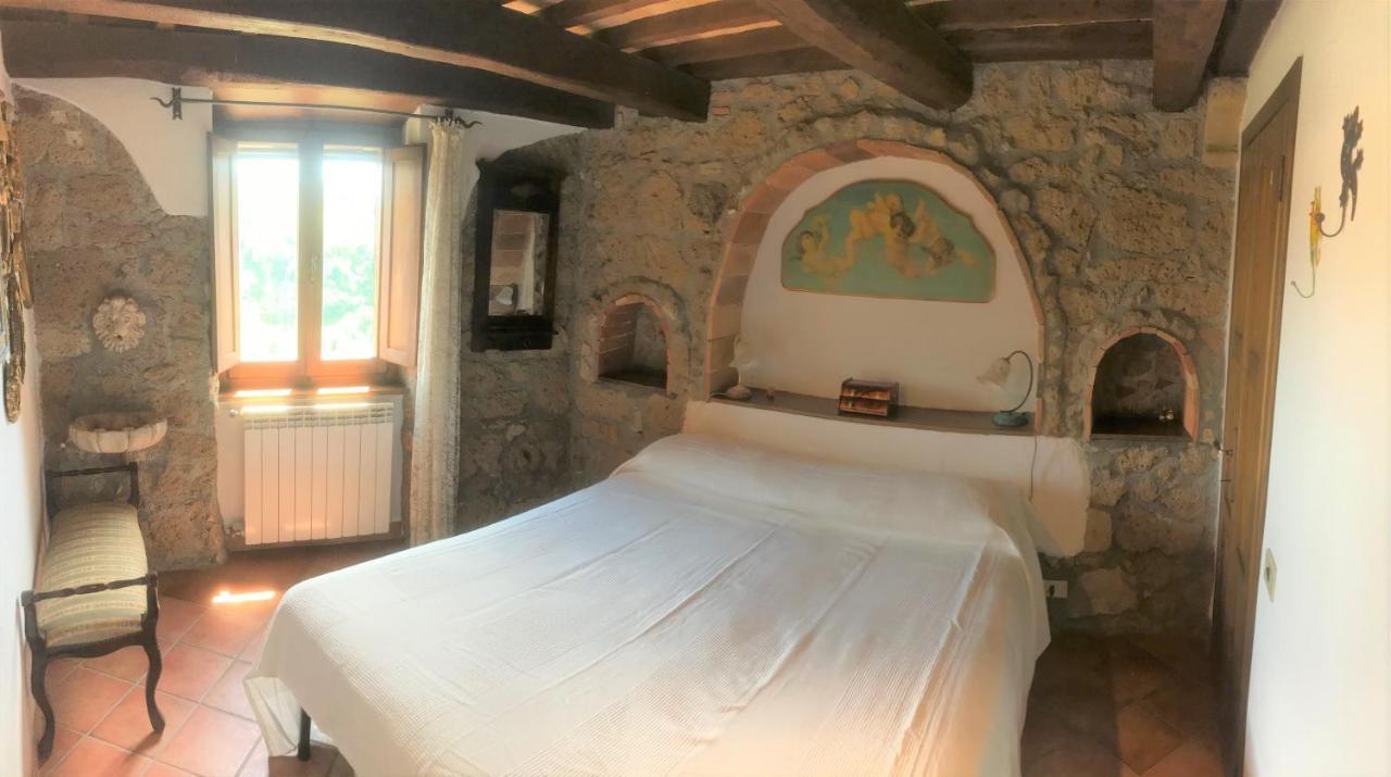 Апартаменты La Casa Nel Tufo Питильяно Экстерьер фото